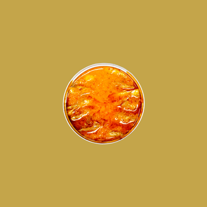 Tinned fish small sardines in a red pepper, chili and garlic creamy sauce